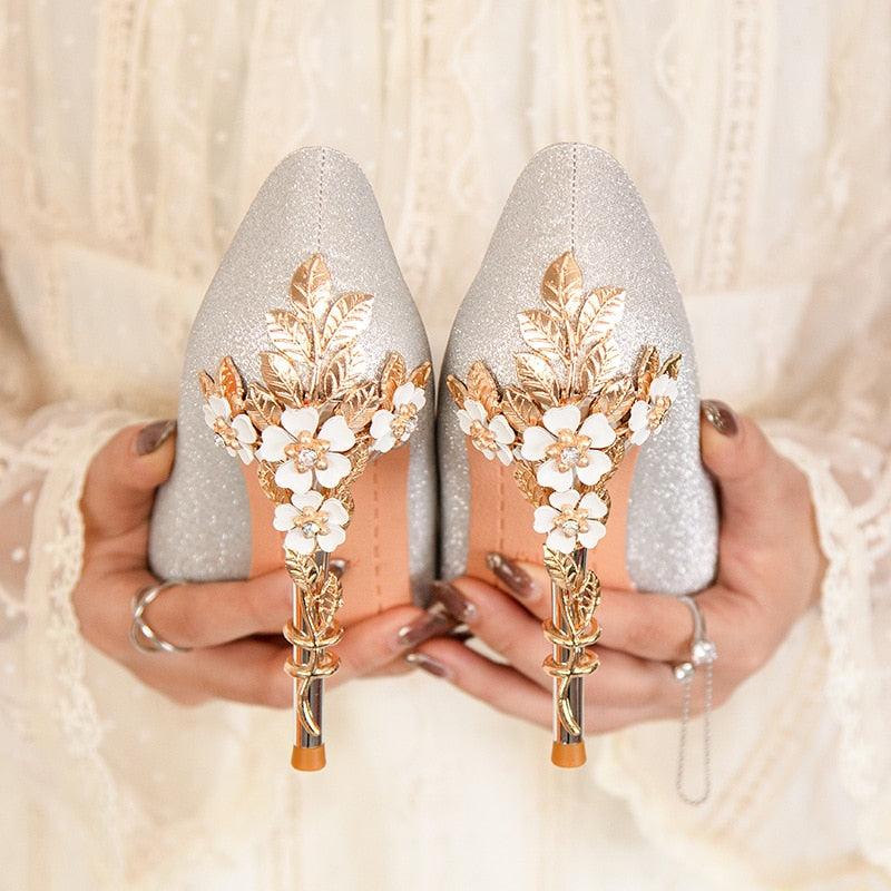 High-quality Wedding Shoes with Metal Flowers Designs on the back heels.