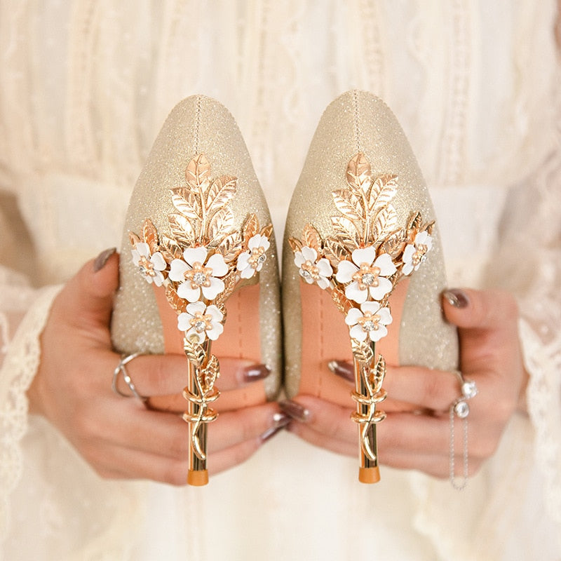 High-quality Wedding Shoes with Metal Flowers Designs on the back heels.
