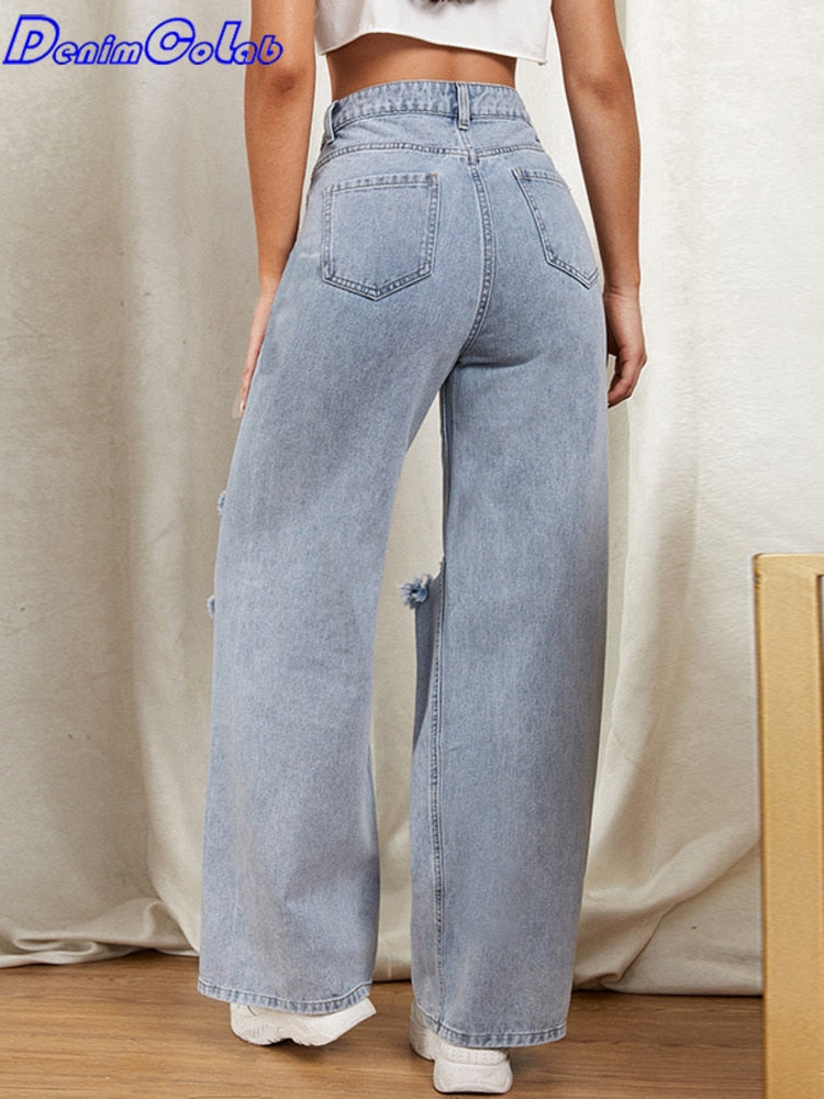 Denim With knee Hole, And Wide Pant Leg.