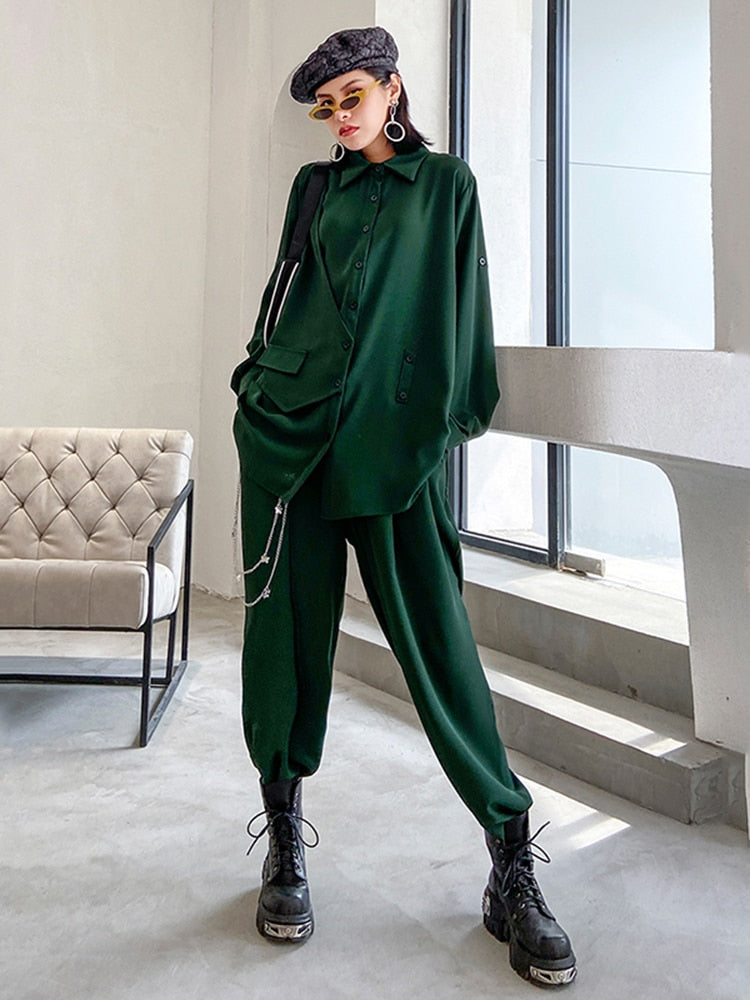 Two-piece suit, with wide-leg pants, signature irregular pleated loose blouse