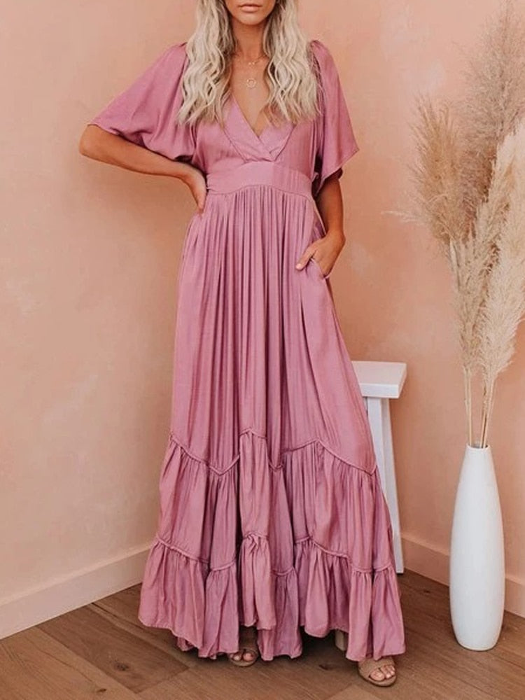 Loose maxi dress with ruffle hem, suitable for daily and beach wear.