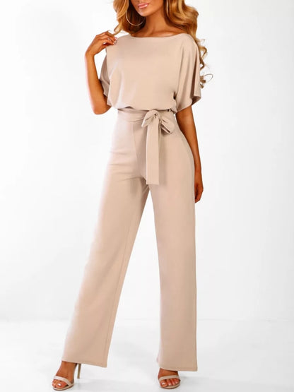 An elegant one-piece jumpsuit with a high waist and short flared sleeves, featured in several colors, with a tie at the waist