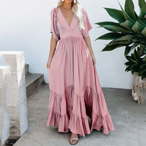 Loose maxi dress with ruffle hem, suitable for daily and beach wear.