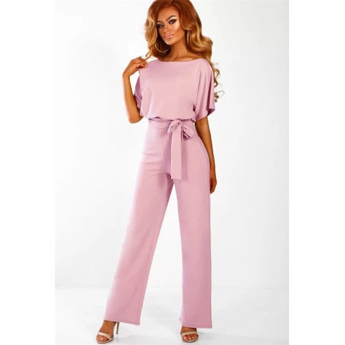 An elegant one-piece jumpsuit with a high waist and short flared sleeves, featured in several colors, with a tie at the waist