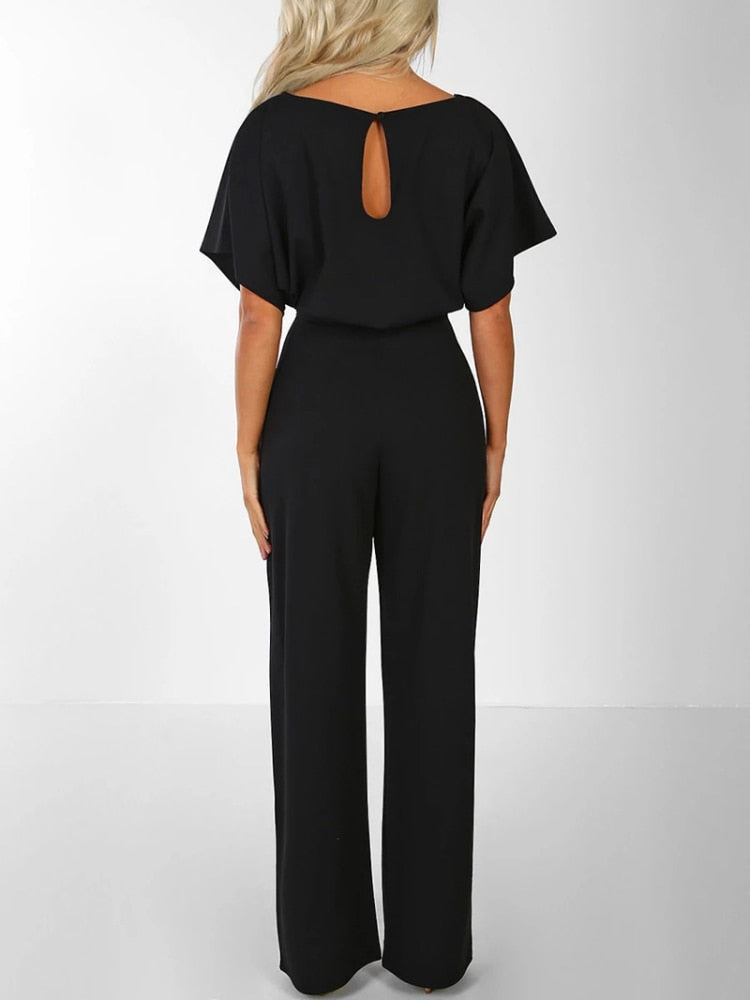 An elegant one-piece jumpsuit with a high waist and short flared sleeves, featured in several colors, with a tie at the waist