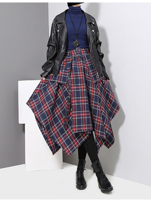 Women's mid-length skirt, with a distinctive cut with triangle layers, and a check print.